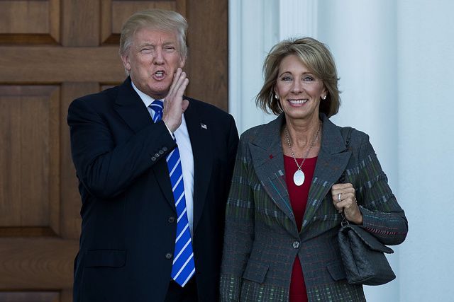 Donald Trump with his pick for education secretary, Betsy Devos.